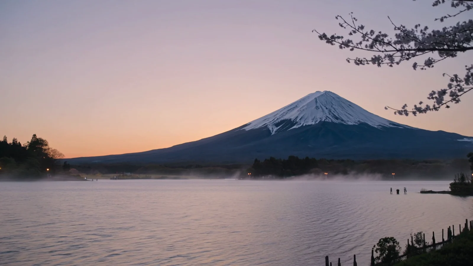 Mount Fuji across a still lake in the soft light of dawn, from our original Japan film.